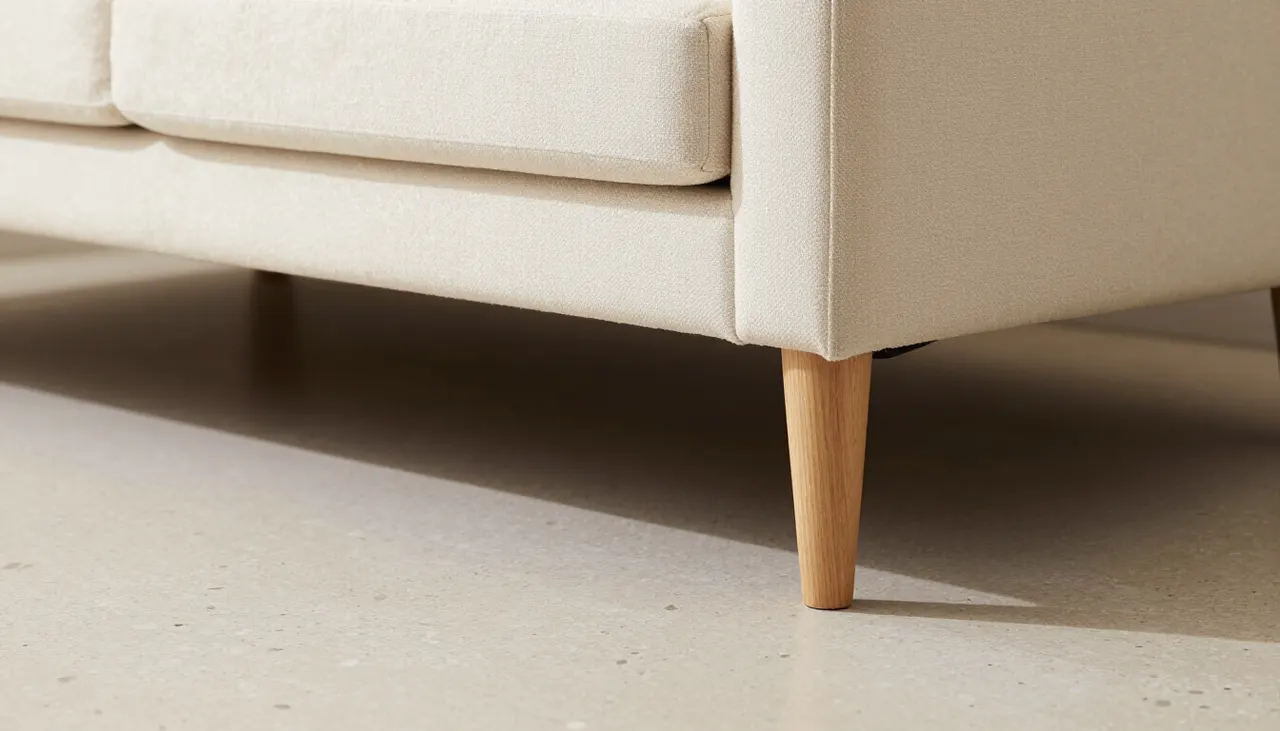 Canapé d'angle surélevé sur pieds en bois